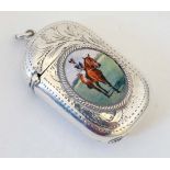 A white metal vesta case with later applied enamel cabochon depicting a race horse and jockey. The