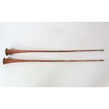 Two late 19thC brass and copper coaching horn. The longest being 50'' long CONDITION: Please Note -