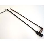 Equestrian: A mid 20thC black '' Swaine Adeney Briggs '' short riding whip together with another