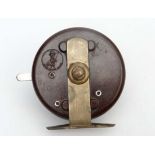 Fishing :A Modern Arms Co Bakelite Trotting Reel with two handles and 8 holes, free run and