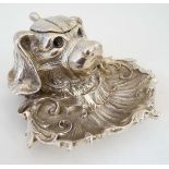 A late 20thC silver plated inkwell / Standish  formed as a dogs head. Aprox 2 ¾” high x  5 ½”
