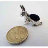 A 925 silver novelty pin cushion formed as a hare. 1” high  CONDITION: Please Note -  we do not make