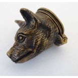 A novelty brass vesta case formed as the head of a dog / fox with hinged lid to one end 1 1/4" long