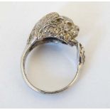 Big Game : A hallmarked silver ring with lions head and tail decoration. Hallmarked Sheffield 1987