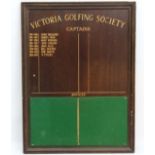 A '' Victoria Golfing Society '' notice board, showing the captains for the years 1993-2003. 49''