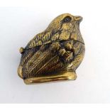 A novelty pot / vesta formed as a chick, hinging open to centre  1 ½” high  CONDITION: Please Note -