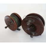 Fishing : An old pair of mahogany and brass reels , one a star back , both with 'clicker' button and