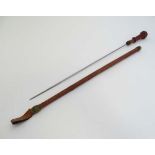 A continental leather covered hunting riding whip, withdrawing to reveal a long slim dispatching