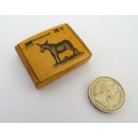 A Novelty boxwood snuff box with image to top of donkey axe and 'MY'  1 1/8" x 1 ¼" x 3/8"