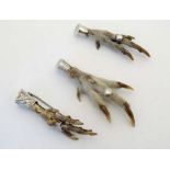 3 various grouse foot brooches, one silver mounted. The largest 3 ¼” long. (3) CONDITION: Please