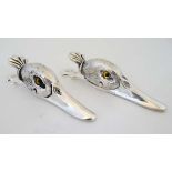 A pair of novelty silver plate letter / paper clips of duck head form. Each approx  5” long