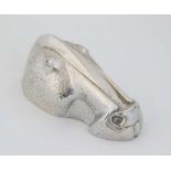 A paperweight formed as a stylized Art Deco horseshead by F Barnley and marked under Christofle