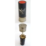 Shooting : A cigarette dispenser formed as a shotgun cartridge , 7 1/2" tall CONDITION: Please