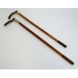 Hunting: A c1900 antler handled cane hunting whip with applied silver mount bearing  ' Brigg '