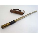 Deerstalking : A three - drawer telescope , of brass construction overall with one leather covered