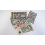 6 Bank notes to include 2 x £1 notes, 1 x 10 shilling, 1 x Cem Escudos Banco de Mocambique and 2