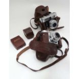 Cameras : two Voitlander cameras ( Vito CLR & VitoB)  together with leather cases, two lens ends and