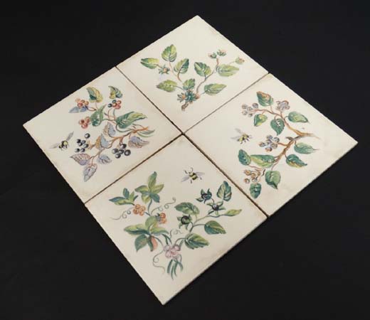 A group of 4 Pilkington tiles , transfer printed with fruiting plants and insects, having makers