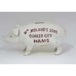 A painted cast Pig bank CONDITION: Please Note -  we do not make reference to the condition of