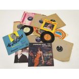 Collectable vinyl records : A collection of nine 1960s and later 45rpm singles , comprising '