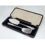 A cased pair of silver plate fish servers. The case 12 1/2" wide  CONDITION: Please Note -  we do