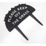 A cast"Keep off the grass" sign with spoke CONDITION: Please Note -  we do not make reference to the