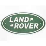 A large cast "Land Rover" sign CONDITION: Please Note -  we do not make reference to the condition