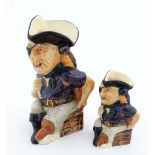 Two Crown Devon '' Long John Silver '' character jugs, bearing factory stamps to bases. The taller