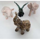 4 x figurines (2 elephants, pig and goose) CONDITION: Please Note -  we do not make reference to the