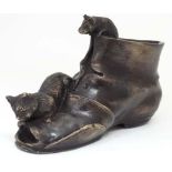 A novelty Bronze figure group formed as a shoe with cat and mouse  CONDITION: Please Note -  we do