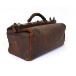 An old Doctors Gladstone like leather case. 16" wide  CONDITION: Please Note -  we do not make