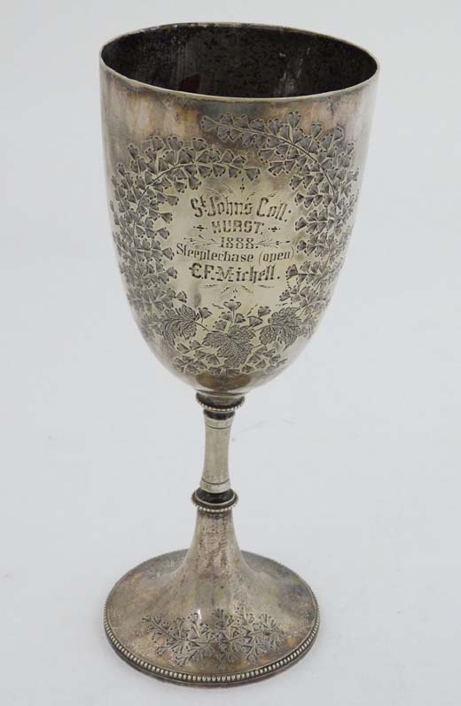 A Victorian silver plate trophy cup of chalice form engraved ' St Johns Coll:  Hurst 1888