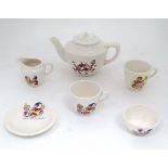 A c1960 child's miniature ''  Noddy '' tea set. Teapot 3 3/4'' high. CONDITION: Please Note -  we do