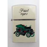 A cigarette lighter with enamel decoration of a Fiat motor car  CONDITION: Please Note -  we do