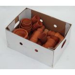 Quantity of small terracotta plant pots