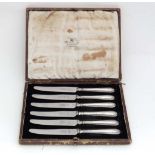 A cased set of 6 silver handled butter knives  CONDITION: Please Note -  we do not make reference to