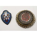 2 gilt metal brooches with enamel decoration one with Persian like script. The largest 2" diameter.