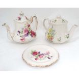 2 teapots ( one with stand)  CONDITION: Please Note -  we do not make reference to the condition
