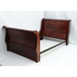 A French mahogany sleigh bed  measuring 52 1/2" wide  CONDITION: Please Note -  we do not make