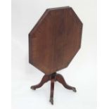Octagonal tilt top occasional table  CONDITION: Please Note -  we do not make reference to the