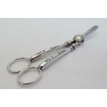 A pair of silver plate grape shears. 6 3/4" long  CONDITION: Please Note -  we do not make reference