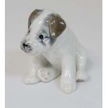 A Russian Konakova ceramic terrier puppy dog figurine, having factory stamps to base. 4 1/4'' high.