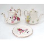 2 teapots ( one with stand)  CONDITION: Please Note -  we do not make reference to the condition