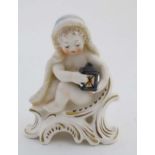 A Goebel putto porcelain figurine ,  number 12 004-12 , W. Germany 1977, having makers stamp to base