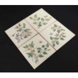 A group of 4 Pilkington tiles , transfer printed with fruiting plants and insects, having makers