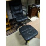 Leather armchair and foot stool CONDITION: Please Note -  we do not make reference to the