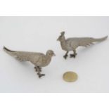 A pair of peacock / pheasant silver plated place card/ menu holders . Approx 5" long  CONDITION: