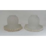 Glass : a pair frilled edge frosted glass light shades, circa , 4 1/4" high and 6" diameter.