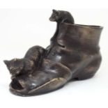 A novelty Bronze figure group formed as a shoe with cat and mouse  CONDITION: Please Note -  we do
