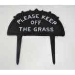 A cast"Keep off the grass" sign with spoke CONDITION: Please Note -  we do not make reference to the